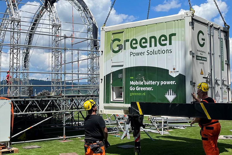 A mobile battery system being installed at a music festival